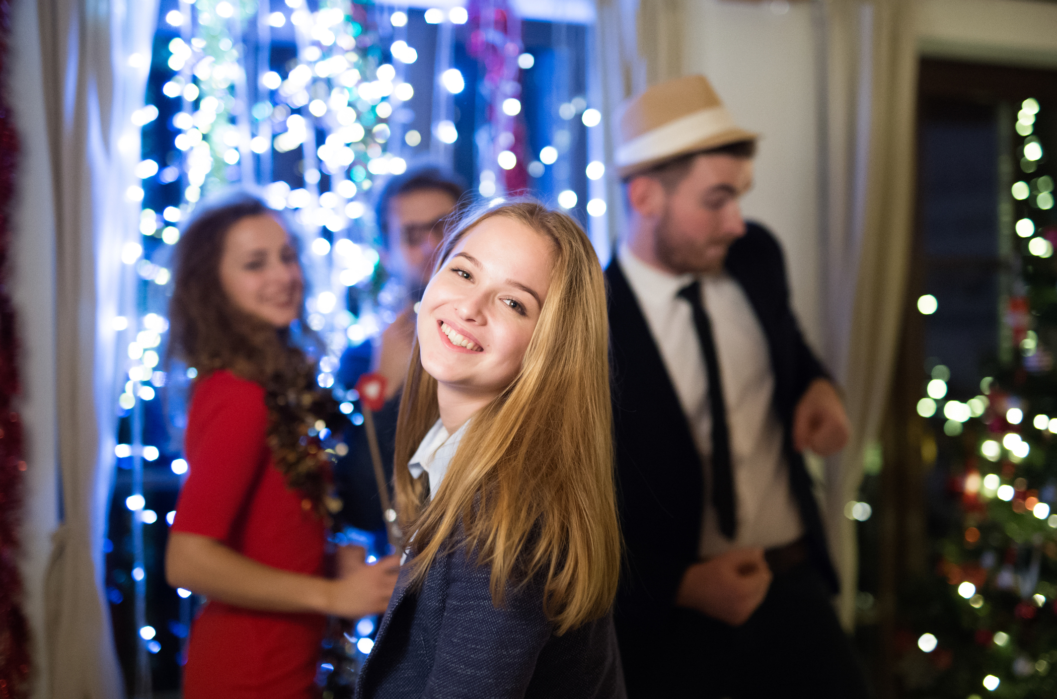 Hipster friends celebrating New Years Eve together, dancing.